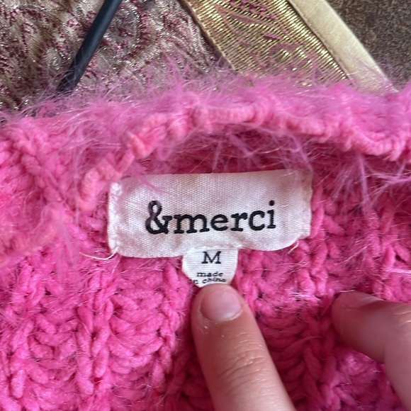 This is a SUPER soft pink sweater that is so cute - Picture 2 of 3